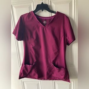Woman’s maroon scrub top size L